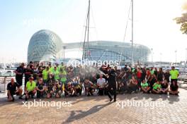 Teams and Pirelli motorhome hospitality group photograph. 28.11.2023. Formula 1 Testing, Yas Marina Circuit, Abu Dhabi, Tuesday.