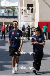 (L to R): Daniel Ricciardo (AUS) AlphaTauri with team mate Yuki Tsunoda (JPN) AlphaTauri. 24.11.2023. Formula 1 World Championship, Rd 23, Abu Dhabi Grand Prix, Yas Marina Circuit, Abu Dhabi, Practice Day.