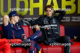 (L to R): Max Verstappen (NLD) Red Bull Racing and George Russell (GBR) Mercedes AMG F1 in the post race FIA Press Conference. 26.11.2023. Formula 1 World Championship, Rd 23, Abu Dhabi Grand Prix, Yas Marina Circuit, Abu Dhabi, Race Day.