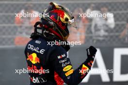 Race winner Max Verstappen (NLD) Red Bull Racing celebrates in parc ferme. 26.11.2023. Formula 1 World Championship, Rd 23, Abu Dhabi Grand Prix, Yas Marina Circuit, Abu Dhabi, Race Day.