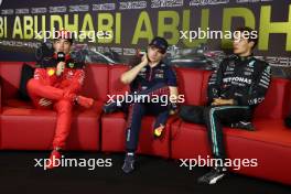 (L to R): Charles Leclerc (MON) Ferrari; Max Verstappen (NLD) Red Bull Racing and George Russell (GBR) Mercedes AMG F1 in the post race FIA Press Conference. 26.11.2023. Formula 1 World Championship, Rd 23, Abu Dhabi Grand Prix, Yas Marina Circuit, Abu Dhabi, Race Day.