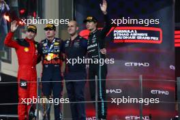 The podium (L to R): Charles Leclerc (MON) Ferrari, second; Max Verstappen (NLD) Red Bull Racing, race winner; Jamie Meades (GBR) Red Bull Racing Head Of Supply Chain Operations; George Russell (GBR) Mercedes AMG F1, third. 26.11.2023. Formula 1 World Championship, Rd 23, Abu Dhabi Grand Prix, Yas Marina Circuit, Abu Dhabi, Race Day.