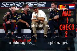 (L to R): Christian Horner (GBR) Red Bull Racing Team Principal celebrates at the podium with Orlando Bloom (GBR) Actor.  26.11.2023. Formula 1 World Championship, Rd 23, Abu Dhabi Grand Prix, Yas Marina Circuit, Abu Dhabi, Race Day.