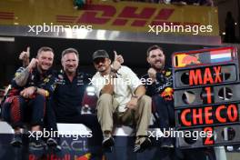 Christian Horner (GBR) Red Bull Racing Team Principal celebrates at the podium with Orlando Bloom (GBR) Actor.  26.11.2023. Formula 1 World Championship, Rd 23, Abu Dhabi Grand Prix, Yas Marina Circuit, Abu Dhabi, Race Day.