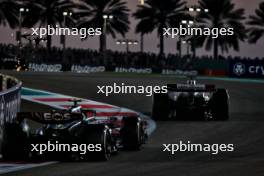 Valtteri Bottas (FIN) Alfa Romeo F1 Team C43 leads Lewis Hamilton (GBR) Mercedes AMG F1 W14. 26.11.2023. Formula 1 World Championship, Rd 23, Abu Dhabi Grand Prix, Yas Marina Circuit, Abu Dhabi, Race Day.