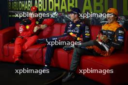(L to R): Charles Leclerc (MON) Ferrari; Max Verstappen (NLD) Red Bull Racing; and Oscar Piastri (AUS) McLaren in the post qualifying FIA Press Conference. 25.11.2023. Formula 1 World Championship, Rd 23, Abu Dhabi Grand Prix, Yas Marina Circuit, Abu Dhabi, Qualifying Day.