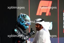 (L to R): George Russell (GBR) Mercedes AMG F1 with Mohammed Bin Sulayem (UAE) FIA President in qualifying parc ferme. 25.11.2023. Formula 1 World Championship, Rd 23, Abu Dhabi Grand Prix, Yas Marina Circuit, Abu Dhabi, Qualifying Day.
