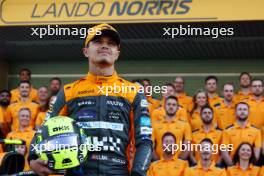 Lando Norris (GBR) McLaren at a team photograph. 26.11.2023. Formula 1 World Championship, Rd 23, Abu Dhabi Grand Prix, Yas Marina Circuit, Abu Dhabi, Race Day.
