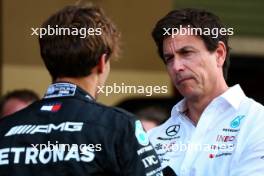 (L to R): George Russell (GBR) Mercedes AMG F1 with Toto Wolff (GER) Mercedes AMG F1 Shareholder and Executive Director. 23.11.2023. Formula 1 World Championship, Rd 23, Abu Dhabi Grand Prix, Yas Marina Circuit, Abu Dhabi, Preparation Day.