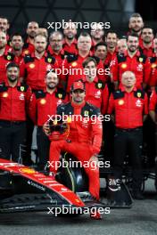 Carlos Sainz Jr (ESP) Ferrari at a team photograph. 23.11.2023. Formula 1 World Championship, Rd 23, Abu Dhabi Grand Prix, Yas Marina Circuit, Abu Dhabi, Preparation Day.