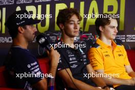 (L to R): Daniel Ricciardo (AUS) AlphaTauri; George Russell (GBR) Mercedes AMG F1; and Oscar Piastri (AUS) McLaren, in the FIA Press Conference. 23.11.2023. Formula 1 World Championship, Rd 23, Abu Dhabi Grand Prix, Yas Marina Circuit, Abu Dhabi, Preparation Day.