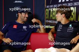 (L to R): Daniel Ricciardo (AUS) AlphaTauri and George Russell (GBR) Mercedes AMG F1 in the FIA Press Conference. 23.11.2023. Formula 1 World Championship, Rd 23, Abu Dhabi Grand Prix, Yas Marina Circuit, Abu Dhabi, Preparation Day.