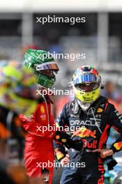 (L to R): Charles Leclerc (MON) Ferrari and Sergio Perez (MEX) Red Bull Racing in parc ferme. 22.10.2023. Formula 1 World Championship, Rd 19, United States Grand Prix, Austin, Texas, USA, Race Day.