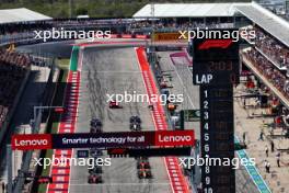 Charles Leclerc (MON) Ferrari SF-23 and Lando Norris (GBR) McLaren MCL60 at the start of the race. 22.10.2023. Formula 1 World Championship, Rd 19, United States Grand Prix, Austin, Texas, USA, Race Day.