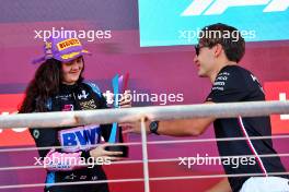 (L to R): Abbi Pulling (GBR) Rodin Carlin receives the second placed trophy on the podium from George Russell (GBR) Mercedes AMG F1. 21.10.2023. F1 Academy, Rd 7, Race 1, Austin, Texas, USA.