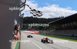 Race winner Richard Verschoor (NED) Van Amersfoort Racing takes the chequered flag at the end of the race. 02.07.2023. FIA Formula 2 Championship, Rd 8, Feature Race, Spielberg, Austria, Sunday.