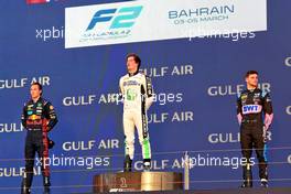 The podium (L to R): Dennis Hauger (DEN) MP Motorsport, second; Ralph Boschung (SUI) Campos Racing, race winner; Victor Martins (FRA) ART Grand Prix, third. 04.03.2023. FIA Formula 2 Championship, Rd 1, Sprint Race, Sakhir, Bahrain, Saturday.