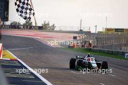 Race winner Ralph Boschung (SUI) Campos Racing takes the chequered flag at the end of the race. 04.03.2023. FIA Formula 2 Championship, Rd 1, Sprint Race, Sakhir, Bahrain, Saturday.