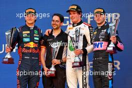 The podium (L to R): Dennis Hauger (DEN) MP Motorsport, second; Ralph Boschung (SUI) Campos Racing, race winner; Victor Martins (FRA) ART Grand Prix, third. 04.03.2023. FIA Formula 2 Championship, Rd 1, Sprint Race, Sakhir, Bahrain, Saturday.