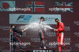 The podium (L to R): Ayumu Iwasa (JPN) Dams, second; Dennis Hauger (DEN) MP Motorsport, race winner; Oliver Bearman (GBR) Prema Racing, third. 22.07.2023. FIA Formula 2 Championship, Rd 10, Budapest, Hungary, Sprint Race, Saturday.