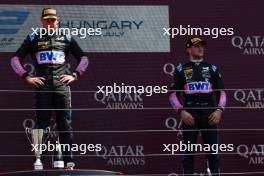 (L to R): Race winner Jack Doohan (AUS) Virtuosi Racing on the podium with third placed Victor Martins (FRA) ART Grand Prix. 23.07.2023. FIA Formula 2 Championship, Rd 10, Budapest, Hungary, Feature Race, Sunday.