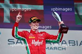 Race winner Frederik Vesti (DEN) Prema Racing celebrates on the podium. 19.03.2023. FIA Formula 2 Championship, Rd 2, Feature Race, Jeddah, Saudi Arabia, Sunday.