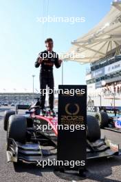Theo Pourchaire (FRA) Alfa Romeo F1 Team Reserve Driver celebrates winning the F2 Championship in parc ferme. 26.11.2023. Formula 2 Championship, Rd 14, Yas Marina Circuit, Abu Dhabi, UAE, Feature Race, Sunday.