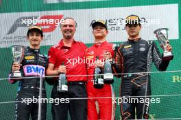 The podium (L to R): Gabriele Mini (ITA) Hitech Pulse-Eight, second; Paul Aron (EST) Prema Racing, race winner; Caio Collet (BRA) Van Amersfoort Racing, third. 01.07.2023. FIA Formula 3 Championship, Rd 6, Sprint Race, Spielberg, Austria, Saturday.