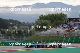 Nikita Bedrin (ITA) Jenzer Motorsport and Roberto Faria (BRA) PHM Racing by Charouz. 02.07.2023. FIA Formula 3 Championship, Rd 6, Feature Race, Spielberg, Austria, Sunday.