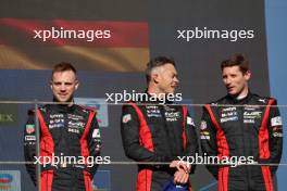(L to R): third placed Laurens Vanthoor (BEL), Andre Lotterer (GER), Kevin Estre (FRA) #06 Porsche Penske Motorsport, on the podium. 16.04.2023. FIA World Endurance Championship, Round 2, Six Hours of Portimao. Portimao, Portugal.