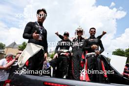 (L to R): Kamui Kobayashi (JPN), Mike Conway (GBR), and Jose Maria Lopez (ARG) #07 Toyota Gazoo Racing, at the drivers' parade. 09.06.2023. FIA World Endurance Championship, Le Mans 24 Hours Parades, Le Mans, France, Friday.