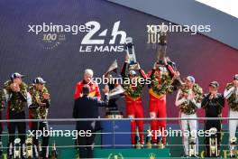 (L to R): Race winners Antonello Coletta (ITA) Head of Ferrari Attivita Sportive GT,  Antonio Giovinazzi (ITA), Alessandro Pier Guidi (ITA), James Calado (GBR) #51 AF Corse Ferrari, celebrate on the podium. 11.06.2023. FIA World Endurance Championship, Le Mans 24 Hours Race, Le Mans, France, Sunday.