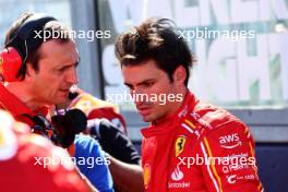Carlos Sainz Jr (ESP) Ferrari with Riccardo Adami (ITA) Ferrari Race Engineer on the grid. 24.03.2024. Formula 1 World Championship, Rd 3, Australian Grand Prix, Albert Park, Melbourne, Australia, Race Day.