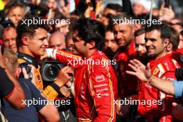 Race winner Carlos Sainz Jr (ESP) Ferrari (Right) celebrates in parc ferme with third placed Lando Norris (GBR) McLaren. 24.03.2024. Formula 1 World Championship, Rd 3, Australian Grand Prix, Albert Park, Melbourne, Australia, Race Day.
