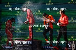 The podium (L to R): Charles Leclerc (MON) Ferrari, second; Carlos Sainz Jr (ESP) Ferrari, race winner; Lando Norris (GBR) McLaren, third; Matteo Togninalli (ITA) Ferrari Head of Track Engineering 24.03.2024. Formula 1 World Championship, Rd 3, Australian Grand Prix, Albert Park, Melbourne, Australia, Race Day.