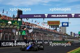 Alexander Albon (THA) Williams Racing FW46 takes the chequered flag at the end of the race. 24.03.2024. Formula 1 World Championship, Rd 3, Australian Grand Prix, Albert Park, Melbourne, Australia, Race Day.