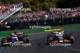 Daniel Ricciardo (AUS) RB VCARB 01 and Nico Hulkenberg (GER) Haas VF-24 battle for position. 24.03.2024. Formula 1 World Championship, Rd 3, Australian Grand Prix, Albert Park, Melbourne, Australia, Race Day.