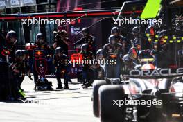Sergio Perez (MEX) Red Bull Racing RB20 makes a pit stop. 24.03.2024. Formula 1 World Championship, Rd 3, Australian Grand Prix, Albert Park, Melbourne, Australia, Race Day.