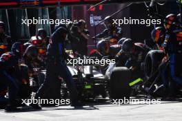 Sergio Perez (MEX) Red Bull Racing RB20 makes a pit stop. 24.03.2024. Formula 1 World Championship, Rd 3, Australian Grand Prix, Albert Park, Melbourne, Australia, Race Day.