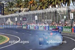 Max Verstappen (NLD) Red Bull Racing RB20 with a smoking rear brake that led to his retirement. 24.03.2024. Formula 1 World Championship, Rd 3, Australian Grand Prix, Albert Park, Melbourne, Australia, Race Day.