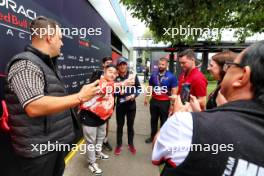Sergio Perez (MEX) Red Bull Racing with fans. 23.03.2024. Formula 1 World Championship, Rd 3, Australian Grand Prix, Albert Park, Melbourne, Australia, Qualifying Day.