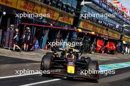 Sergio Perez (MEX) Red Bull Racing RB20 leaves the pits. 23.03.2024. Formula 1 World Championship, Rd 3, Australian Grand Prix, Albert Park, Melbourne, Australia, Qualifying Day.