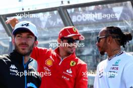 (L to R): Charles Leclerc (MON) Ferrari and Lewis Hamilton (GBR) Mercedes AMG F1 on the drivers' parade. 24.03.2024. Formula 1 World Championship, Rd 3, Australian Grand Prix, Albert Park, Melbourne, Australia, Race Day.