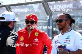 (L to R): Charles Leclerc (MON) Ferrari and Lewis Hamilton (GBR) Mercedes AMG F1 on the drivers' parade. 24.03.2024. Formula 1 World Championship, Rd 3, Australian Grand Prix, Albert Park, Melbourne, Australia, Race Day.