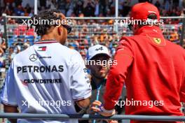 (L to R): Lewis Hamilton (GBR) Mercedes AMG F1 with Pierre Gasly (FRA) Alpine F1 Team and Charles Leclerc (MON) Ferrari on the drivers' parade. 24.03.2024. Formula 1 World Championship, Rd 3, Australian Grand Prix, Albert Park, Melbourne, Australia, Race Day.