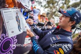Sergio Perez (MEX) Red Bull Racing with fans. 24.03.2024. Formula 1 World Championship, Rd 3, Australian Grand Prix, Albert Park, Melbourne, Australia, Race Day.