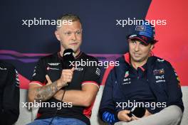 (L to R): Kevin Magnussen (DEN) Haas F1 Team and Sergio Perez (MEX) Red Bull Racing in the FIA Press Conference. 21.03.2024. Formula 1 World Championship, Rd 3, Australian Grand Prix, Albert Park, Melbourne, Australia, Preparation Day.