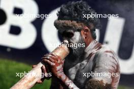 Circuit atmosphere - a didgeridoo player. 21.03.2024. Formula 1 World Championship, Rd 3, Australian Grand Prix, Albert Park, Melbourne, Australia, Preparation Day.