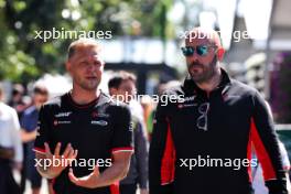 (L to R): Kevin Magnussen (DEN) Haas F1 Team with Stuart Morrison (GBR) Haas F1 Team Head of Communications. 21.03.2024. Formula 1 World Championship, Rd 3, Australian Grand Prix, Albert Park, Melbourne, Australia, Preparation Day.
