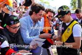 Oscar Piastri (AUS) McLaren with fans. 21.03.2024. Formula 1 World Championship, Rd 3, Australian Grand Prix, Albert Park, Melbourne, Australia, Preparation Day.